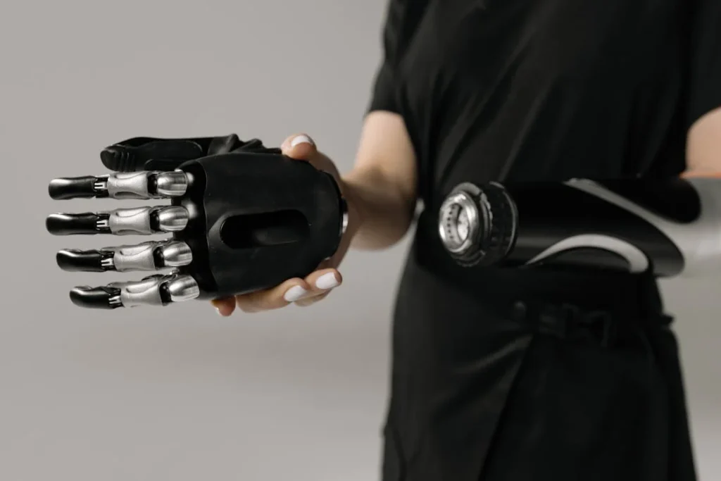 A bionic hand is an advanced prosthetic that mimics natural hand movements using electronic sensors and motors. Unlike mechanical hands, which require physical effort to operate, bionic hands respond to muscle signals.