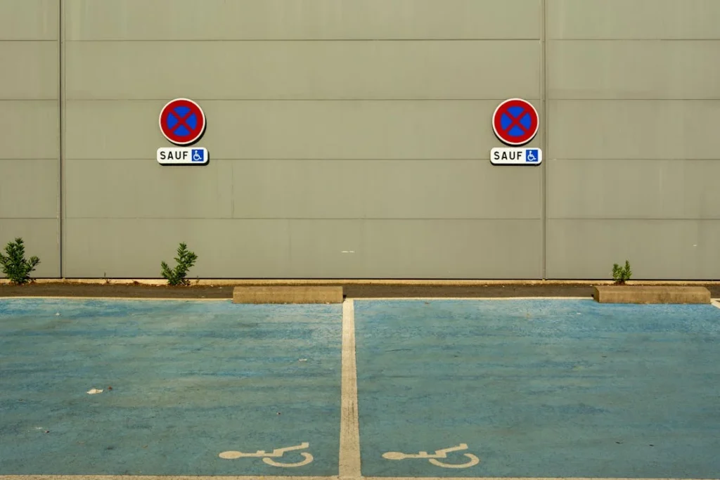 A disability parking permit is a government-issued authorization that allows individuals with disabilities to park in specially designated spaces.