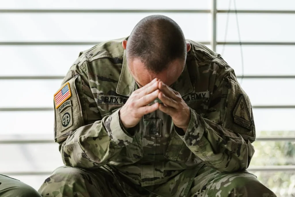 A war veteran with a prosthetic limb carries two identities—one as a soldier, and the other as a person with a disability. On one hand, they are respected for their courage. On the other, they sometimes experience the stigma that comes with physical loss.